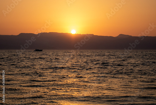 Sunset on beach, orang sky on beach 