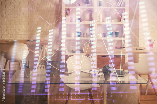 Double exposure of financial graph drawing and office interior background. Concept of stock market.