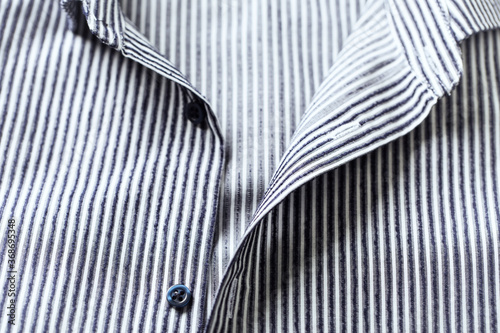 Close up of men's striped shirt. 