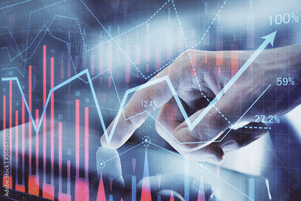 Multi exposure of man's hands holding and using a digital phone and forex graph drawing. Financial market concept. Multi exposure of man's hands holding and using a digital phone and forex graph drawing. Financial market concept.