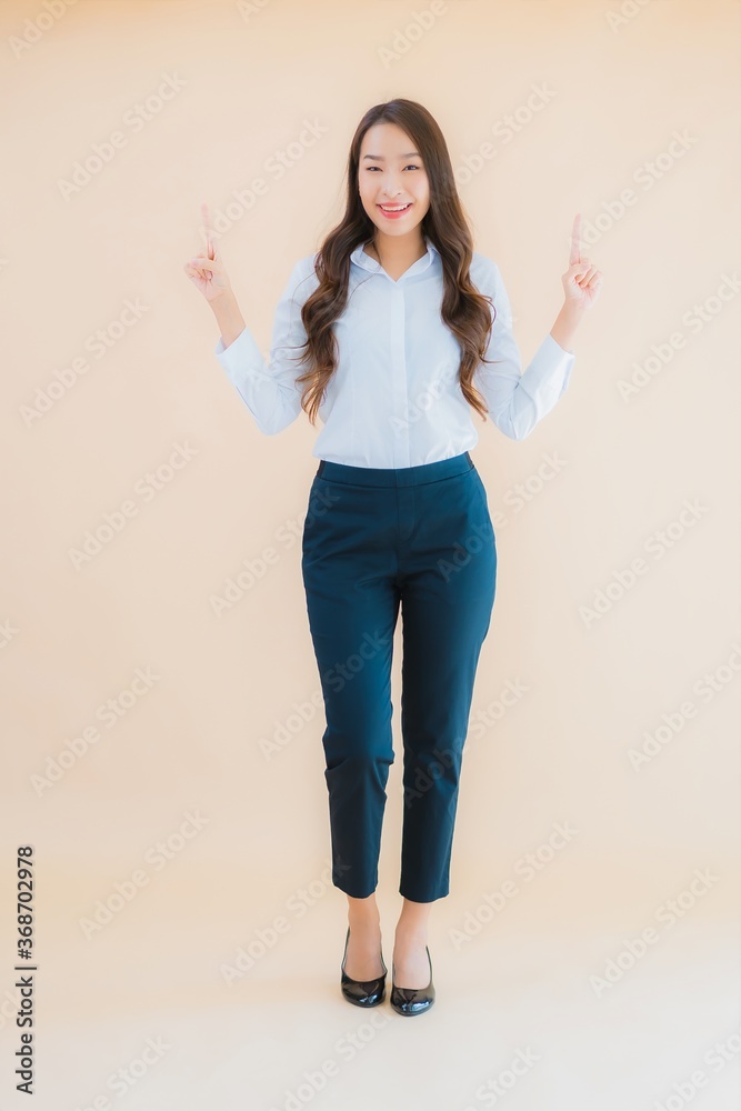 Portrait beautiful young asian business woman in action Portrait beautiful young asian business woman in action