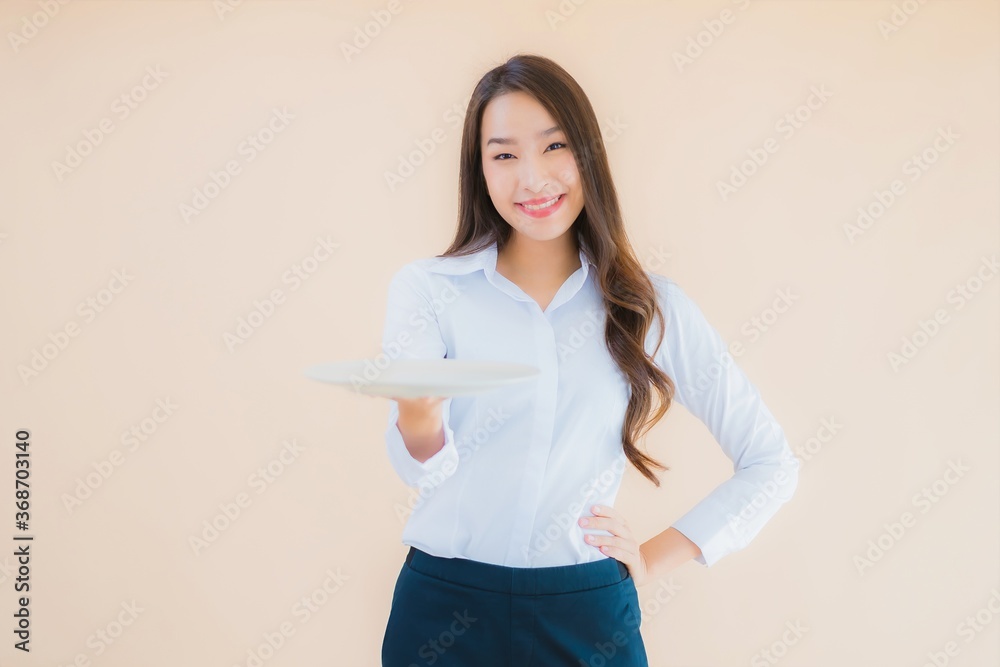 Portrait beautiful young asian woman with plate or dish Portrait beautiful young asian woman with plate or dish
