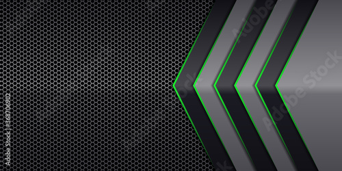 Modern abstract futuristic hexagon carbon fiber and glowing light green luminous lines in black dark room technology background