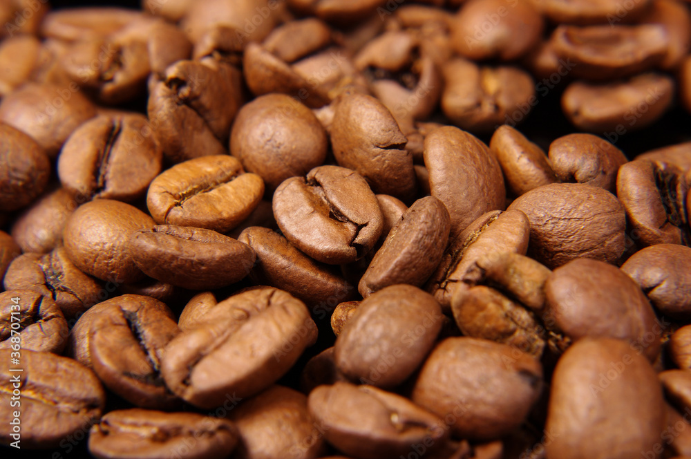 Naklejka premium Abstract macro coffee beans texture