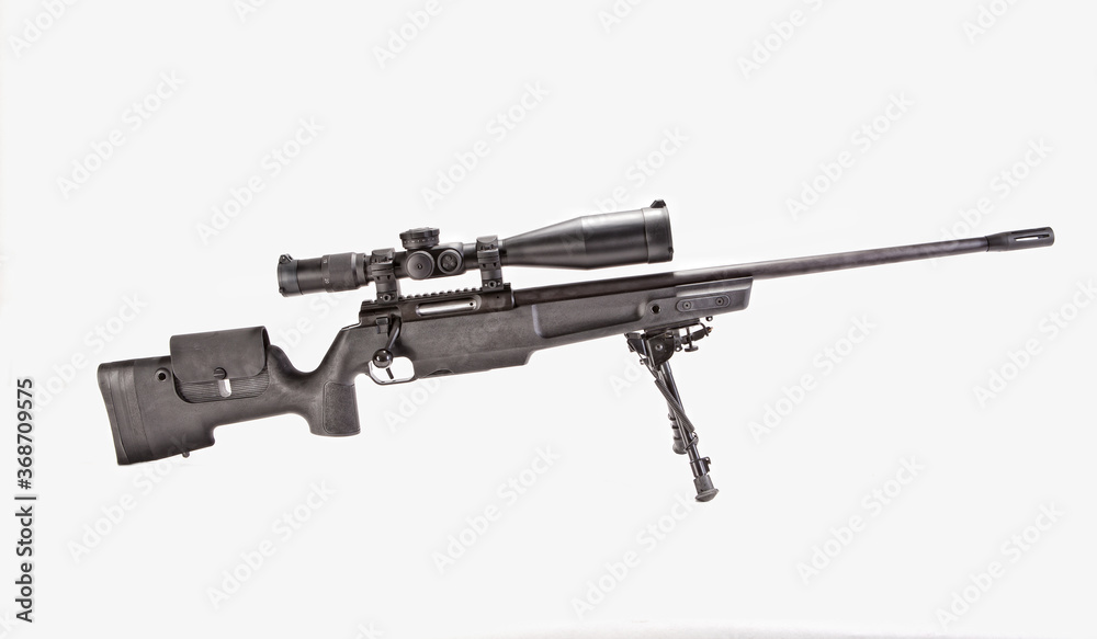 Side view of a Sniper rifle shot in studio. Side view of a Sniper rifle shot in studio.