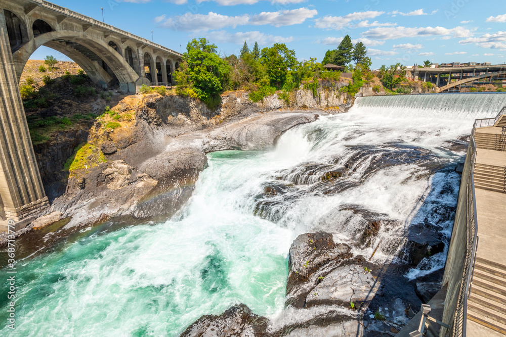 Overhead view of the whitewater Spokane Falls along the Spokane River at Riverfront Park, downtown Spokane Washington, USA. Overhead view of the whitewater Spokane Falls along the Spokane River at Riverfront Park, downtown Spokane Washington, USA.