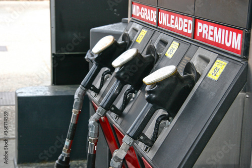 Gas Pumps for Regular, Unleaded and Premium Gasoline at a Service Station
