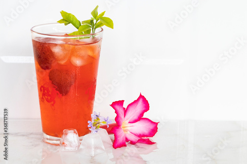 Tableau sur toile herbal healthy drinks cold strawberry juice with pink flower and iced of lifesty