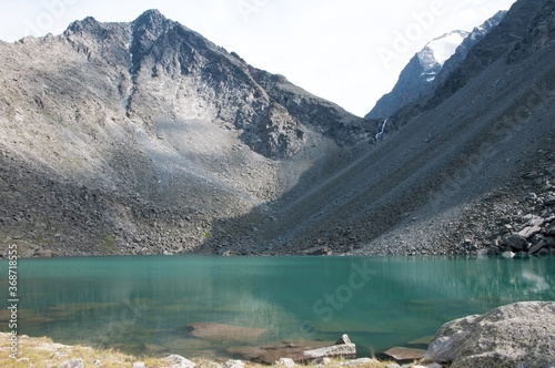 The Lake of the Mountain Spirits with its emerald, crystal clear water. The Altai republic, Russia