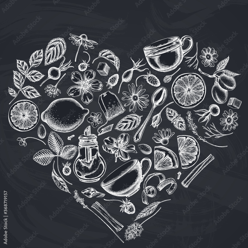 Heart design with chalk cinnamon, lemons, oranges, tea bag, sugar cubes, heather, chamomile, dog rose, peppermint, almond, strawberry, teaspoon, teapots, cups, sugar bowl Heart design with chalk cinnamon, lemons, oranges, tea bag, sugar cubes, heather, chamomile, dog rose, peppermint, almond, strawberry, teaspoon, teapots, cups, sugar bowl