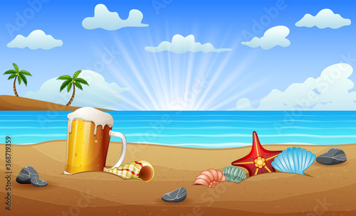 A glass of beer and seashell starfish on the sea sand