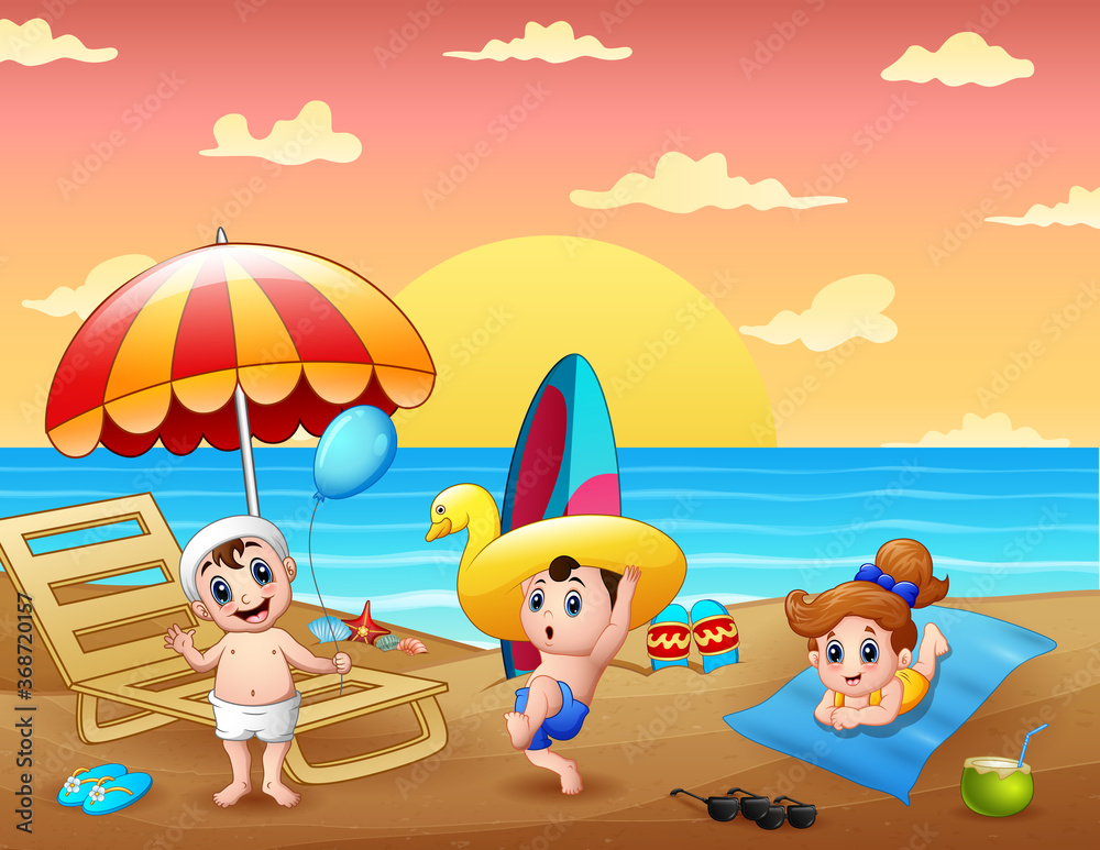 Summer holiday with children having fun at the beach