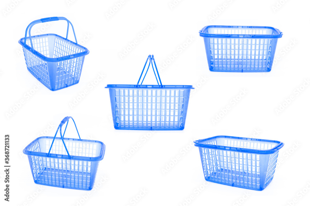 A set of shopping blue plastic baskets isolated on white A set of shopping blue plastic baskets isolated on white