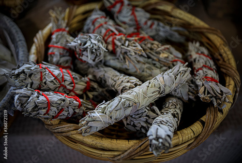 фотографія Traditional Native American Indian ritual white sage smudge sticks for sale at a