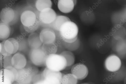 gray bokeh White and Silver lights on bokeh abstract background.