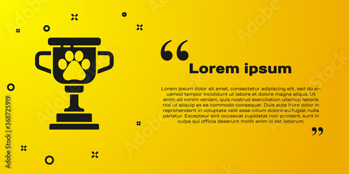 Black Pet award symbol icon isolated on yellow background. Medal with dog footprint as pets exhibition winner concept. Vector.