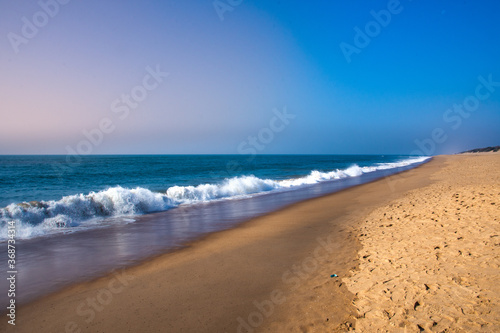 Beautiful Goa Sea beach and water waves at the time of Sunset.