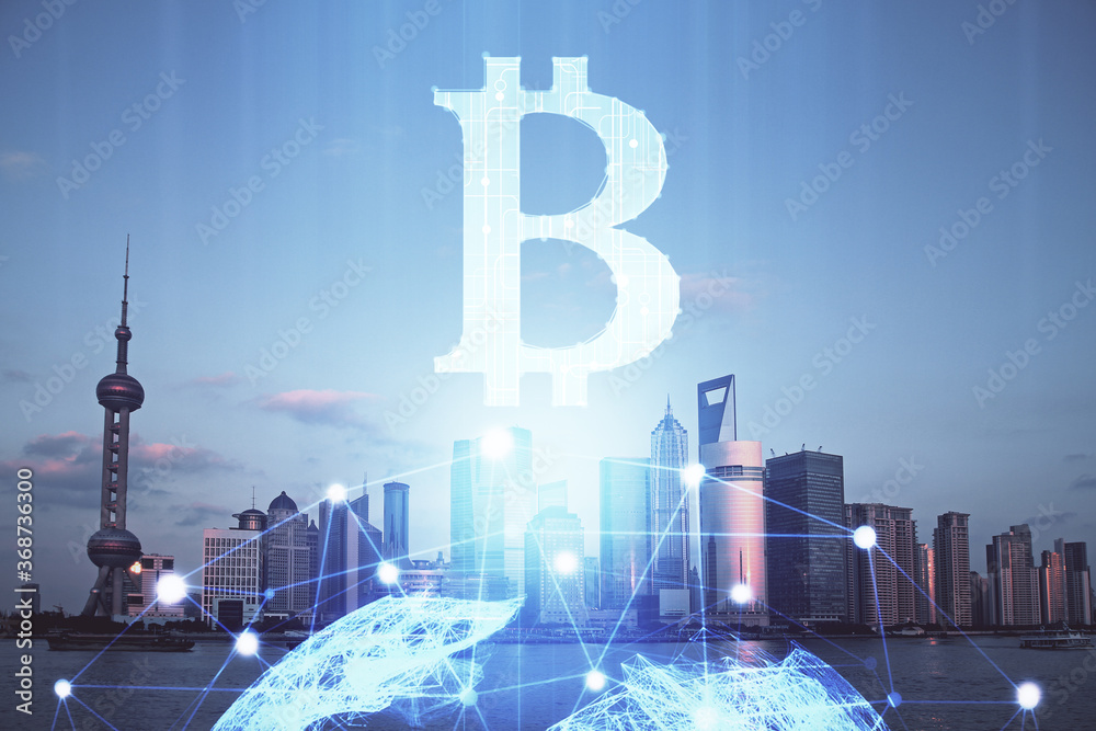 Double exposure of crypto currency theme hologram drawing and city veiw background. Concept of blockchain and bitcoin.