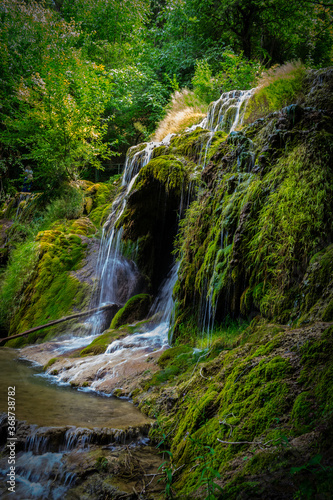Small waterfall in the forest at Krushuna Waterfalls
