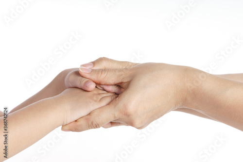 Mother holding her kid hand