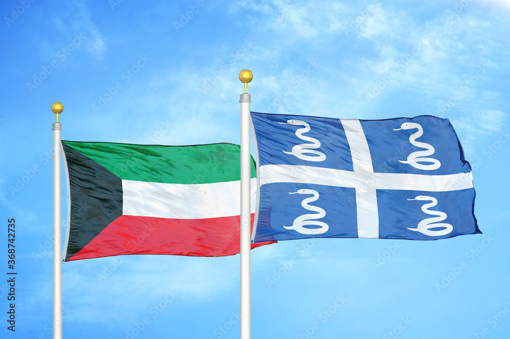 Fototapeta premium Kuwait and Martinique snake two flags on flagpoles and blue sky