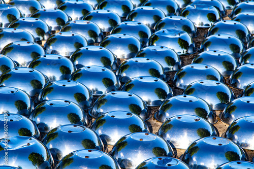 Fotografie Shiny helmets on the ground