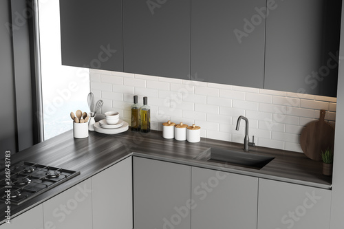 Fototapeta Naklejka Na Ścianę i Meble -  Cabinets in grey kitchen corner