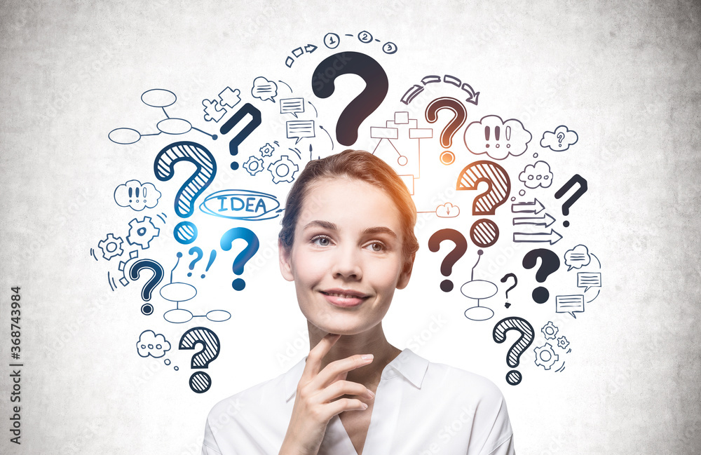 Cheerful young woman, question marks Cheerful young woman, question marks