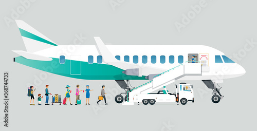Air hostesses are allowing passengers to board the plane with a gray background.