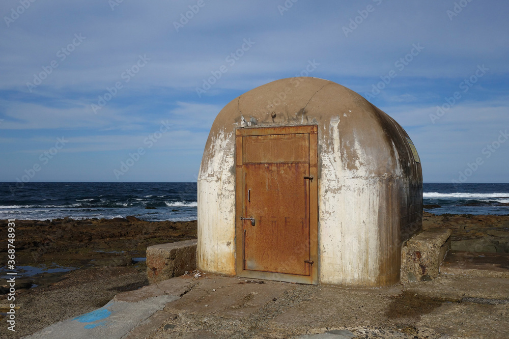 Old rusty pump house at Newcastle beach, NSW, Australia Old rusty pump house at Newcastle beach, NSW, Australia