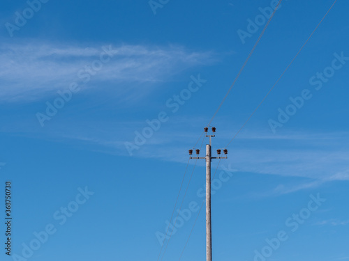 electric pole on a blue sky