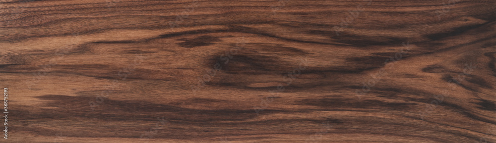 Texture of black walnut board with oil finish Texture of black walnut board with oil finish