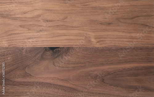 Texture of sanded raw black walnut wood without finish