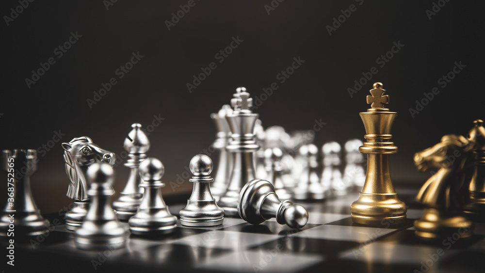 King golden chess standing confront of the silver chess team concepts of leadership and business strategy management and leadership. King golden chess standing confront of the silver chess team concepts of leadership and business strategy management and leadership.