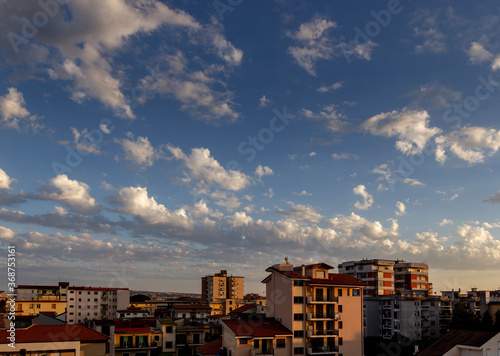 city skyline with clouds of Aversa