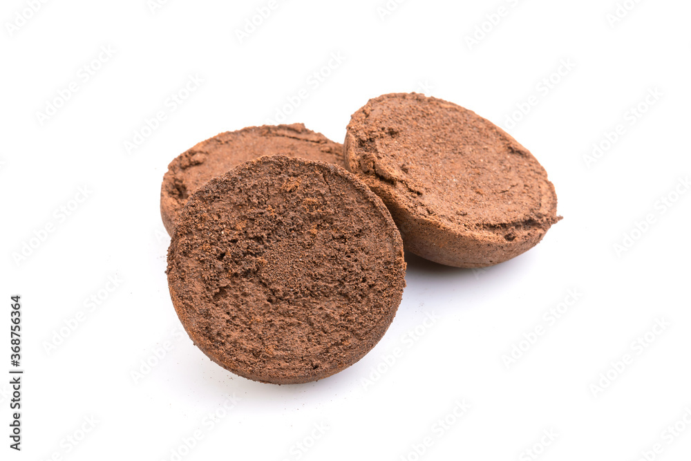 Ground coffee from coffee machine isolated on white background Ground coffee from coffee machine isolated on white background
