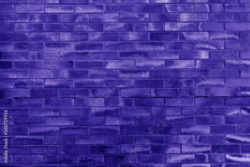 The background of the old violet brick wall for design interior and various scenes or as a background for video interviews.