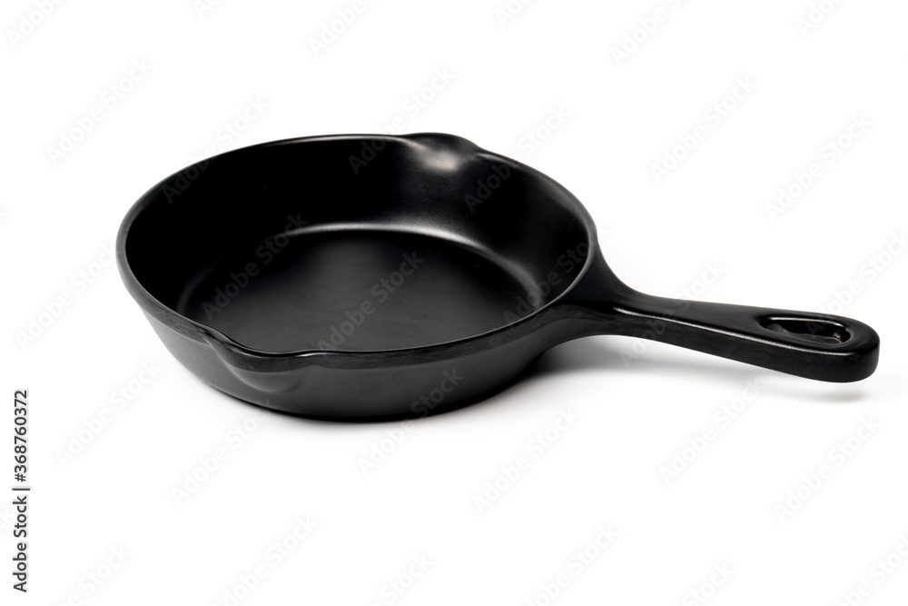 Black pan with coating on isolated white background. Black pan with coating on isolated white background.
