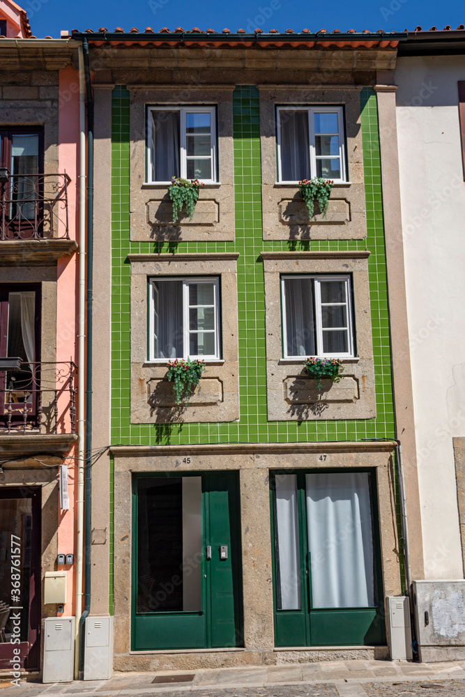 Portugal Apartment Architecture in Braga, Green Tiles, With Flower Pots