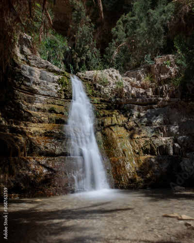 Waterfall in the desert – part of the Ein Gedi oasis natural reserve in southern Israel. Long exposure shot.