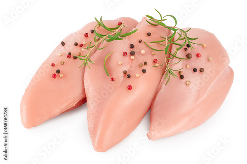 Fresh chicken fillet with rosemary isolated on white background with clipping path and full depth of field.