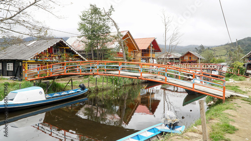 Wallpaper Mural Laguna de la Cocha at El Encano with wooden briges and stilt houses near Pasto, Colombia.
 Torontodigital.ca
