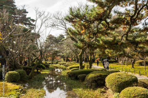 Kanazawa, Japan. Kenroku-en, an old garden, and one of the Three Great Gardens of Japan (Nihon Sanmeien), during autumn photo