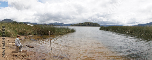 Laguna de la Cocha at El Encano with wooden briges and stilt houses near Pasto, Colombia.
 photo