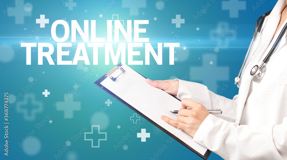 doctor writes notes on the clipboard with ONLINE TREATMENT inscription, first aid concept doctor writes notes on the clipboard with ONLINE TREATMENT inscription, first aid concept