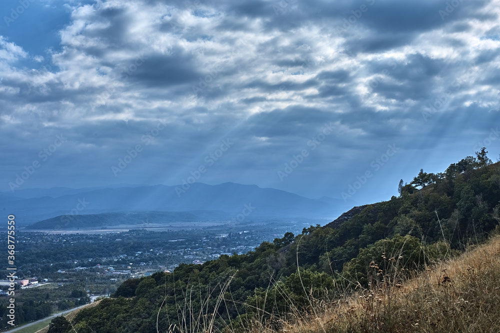 Naklejka premium mountain view sky clouds forest