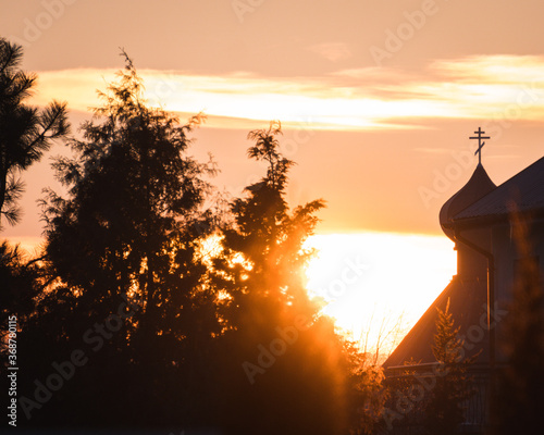 Orthodox church tower during sunset