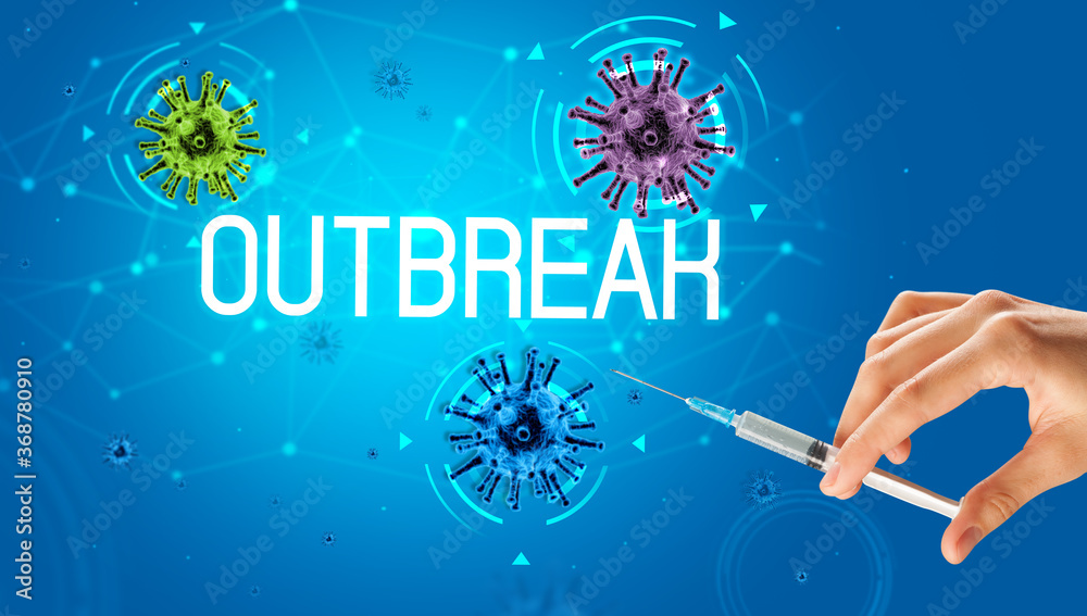 Syringe, medical injection in hand with OUTBREAK inscription, coronavirus vaccine concept Syringe, medical injection in hand with OUTBREAK inscription, coronavirus vaccine concept