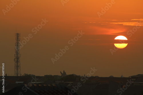 sunset over the city, red sky, red clouds, sunset over the town, Sunset over Surabaya, East Java, Indonesia Photography