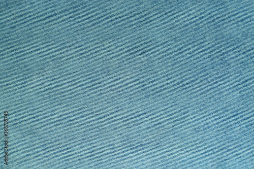 Denim jeans light blue texture background.